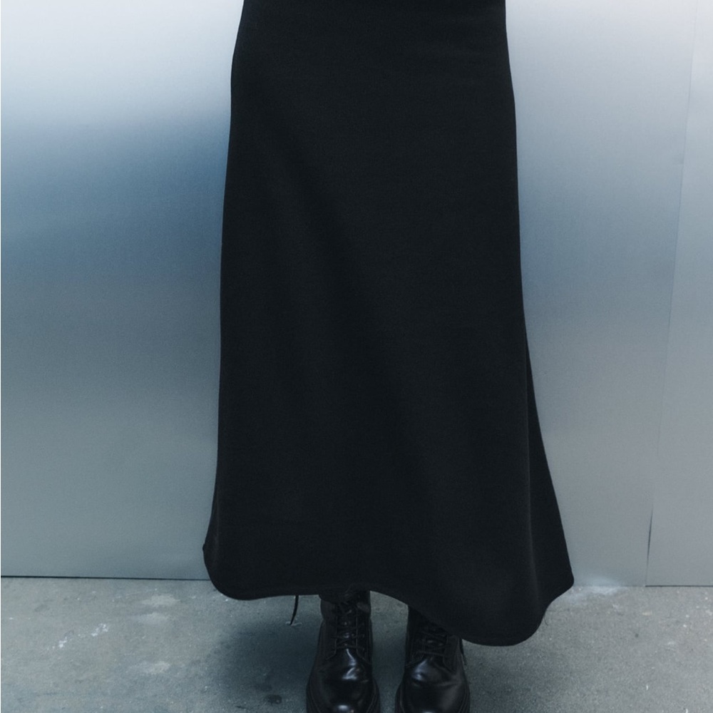 ZARA black knit swing skirt with elastic waist. Size M. Brand new with tags